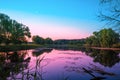 Magical pink purple sunrise over the lake