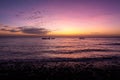 Magical purple and orange sunset with cirrus clouds over the Indian Ocean on the coast of Pemba Island, Tanzania Royalty Free Stock Photo