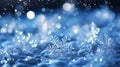 Magical shiny frozen snowflakes and snowfall sky, blue background with beautiful festive light bokeh, winter and Christmas Royalty Free Stock Photo