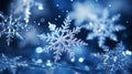 Magical shiny frozen snowflakes and snowfall sky, blue background with beautiful festive light bokeh, winter and Christmas Royalty Free Stock Photo