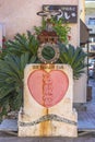 A magical stone monument of Ouk Fashion building where are inscribed the japanese charaters Ishiganto which means stone tablet