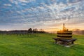 Magical sunset with a dramatic cloudscape in the rolling hills and the vineyards of Wijngaard op gen Heugde in South Limburg