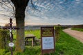 Magical sunset with a dramatic cloudscape in the rolling hills and the vineyards of Wijngaard op gen Heugde in South Limburg