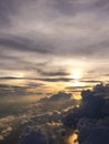 Magical sunset over storm clouds from aircarft window Royalty Free Stock Photo