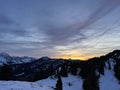 Magical sunset and shy sun behind winter clouds over the Obertoggenburg region and in the Swiss Prealps, UrnÃÂ¤sch / Urnaesch Royalty Free Stock Photo