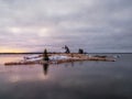 A magical twilight view of the island with a wooden old fishing lodge