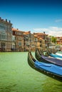 Magical view during sunset over gondolas in Venice, Grand Canal and its historical center, Venice, Italy, summer time, blue sky Royalty Free Stock Photo