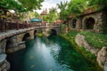 magical water channel, with bridges and fairies, leading to enchanted kingdom