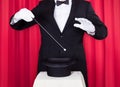 A Magician In A Black Suit Royalty Free Stock Photo