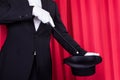 A magician in a black suit Royalty Free Stock Photo