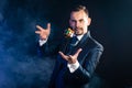 A magician in a blue tailcoat Royalty Free Stock Photo