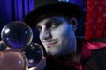 Magician with crystal balls Royalty Free Stock Photo