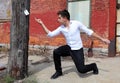 Magician at Detroit Michigan doing street magic in abandoned building at the motor city