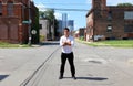 Magician at Detroit Michigan doing street magic in abandoned building at the motor city