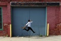 Magician at Detroit Michigan doing street magic in abandoned building at the motor city