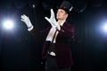 Magician with fly ball, Juggler man, Funny person, Black magic, Illusion A focus with a levitating cane with a magic Royalty Free Stock Photo