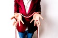 Magician hands handling ropes and bandanas to do magic tricks, isolated on white Royalty Free Stock Photo