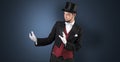 Magician holds something invisible Royalty Free Stock Photo