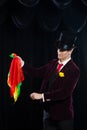 Magician, Juggler man, Funny person, Black magic, Illusion focus with colored cloth with cloths Royalty Free Stock Photo