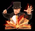 Magician with opened burning book