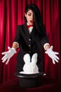 Magician with a rabbit in a hat Royalty Free Stock Photo
