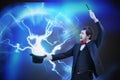 Magician is showing trick with lightning from his magical hat Royalty Free Stock Photo