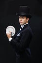 Magician showing trick with playing cards Royalty Free Stock Photo