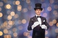 Magician in top hat with magic wand Royalty Free Stock Photo