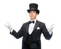 Magician in top hat showing trick Royalty Free Stock Photo