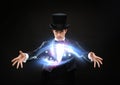 Magician in top hat showing trick Royalty Free Stock Photo