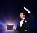 Magician in top hat showing trick Royalty Free Stock Photo