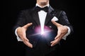 Magician in top hat showing trick Royalty Free Stock Photo