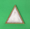 Magnesium chloride in the triangular bowl - Green background Royalty Free Stock Photo
