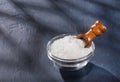 Magnesium chloride in wooden scoop - Text space Royalty Free Stock Photo