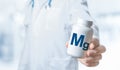 Magnesium, Mg, Mg supplements for human health. Doctor recommends taking Magnesium. doctor talks about Benefits of Mg. Essential Royalty Free Stock Photo