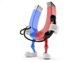 Magnet character holding a telephone handset