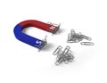 Magnet attracts paper clips on white background. Royalty Free Stock Photo