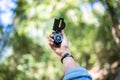 Magnetic compass in hand traveler.