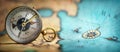 Magnetic old compass on world map. Travel, geography, navigation, tourism and exploration concept background. Macro photo. Very Royalty Free Stock Photo