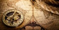 Magnetic old compass on world vintage map 18 century.Travel, geography, navigation, tourism and exploration concept wide Royalty Free Stock Photo