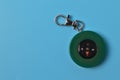 Magnetic qibla compass isolated on blue background