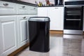 magnetically sealed trash can in the kitchen