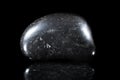 Magnetite mineral, black and reflection, healing stone