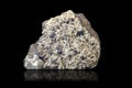 Magnetite with rhinestone crystals on black Royalty Free Stock Photo