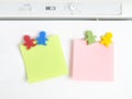 Magnets shaped kids colors with note Royalty Free Stock Photo