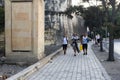 Floriana, Malta, August 2019. Television film crew on the road along the wall.