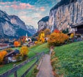 Magnificent autumn view of great waterfall in Lauterbrunnen village. Superb outdoor scene in Swiss Alps, Bernese Oberland in the c Royalty Free Stock Photo