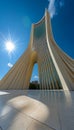 The Magnificent Azadi Tower in Tehran, Iran A Modern Architectural Marvel Soaring into the Blue Sky Royalty Free Stock Photo