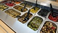 Magnificent background with a salad bar with olives. Healthy food Royalty Free Stock Photo