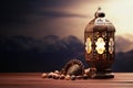 Bronze lantern with islamic rosary and mountain background